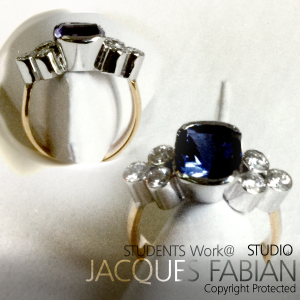 18ct Yellow and White Gold Ring featuring Diamonds and Sapphire